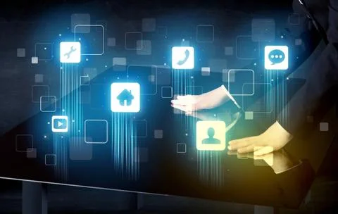 Modern smart table with high tech icons on its interface screen concept Stock Photos