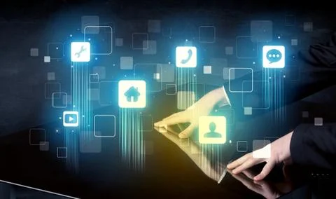 Modern smart table with high tech icons on its interface screen Foto stock