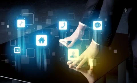 Modern smart table with high tech icons on its interface screen Stock Photos