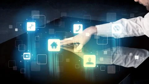 Modern smart table with high tech icons on its interface screen 스톡 사진