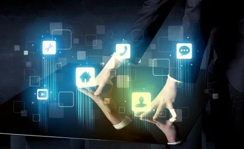 Modern smart table with high tech icons on its interface screen 스톡 사진