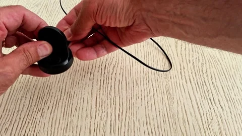 Modern Smart Watch Charger plugged into the Mains Stock Footage 339846924