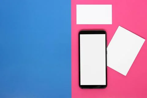 Modern smartphone with a blank screen , white card and business card Stock-Fotos