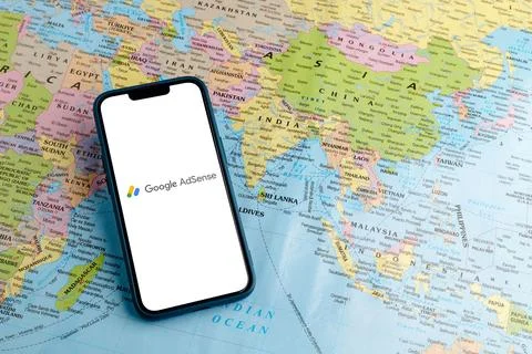Modern smartphone with a Google Ads logo displayed on the screen. Stock Photos