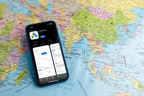Modern smartphone with a Google Ads logo displayed on the screen. Stock Photos