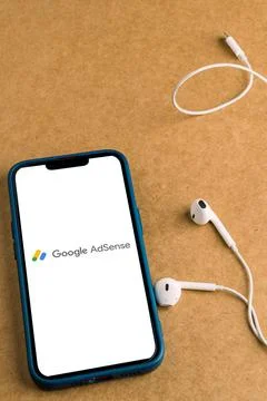 Modern smartphone with a Google Ads logo displayed on the screen. Stock Photos