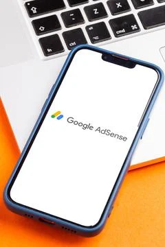 Modern smartphone with a Google Ads logo displayed on the screen. Stock Photos