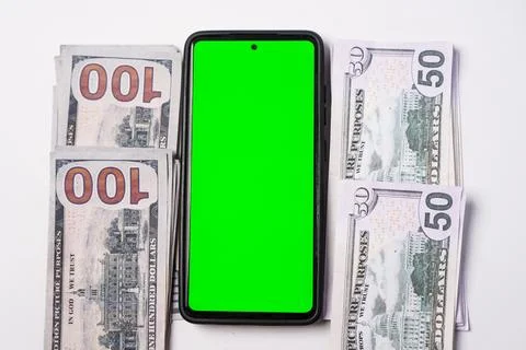 A modern smartphone green screen placed vertically at the center, flanked b.. Stock Photos