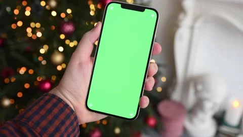 Modern smartphone in hand with green screen chromakey  Stock Footage 166178949