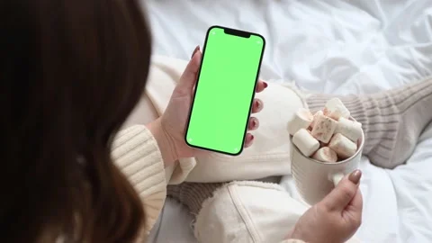 Modern smartphone in hand with green screen chromakey  Stock Footage 166179005