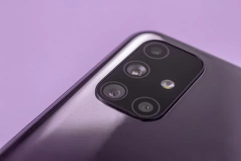 A modern smartphone with multiple camera lenses and a built-in close-up flash Stock Photos