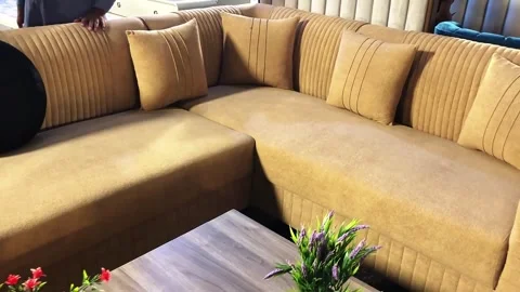 Modern Sofa Set with Wooden Coffee Table and Flower Vases | Stylish Living Room  스톡 동영상 343620401