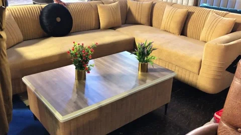 Modern Sofa Set with Wooden Coffee Table and Flower Vases | Stylish Living Room  스톡 동영상 344647665