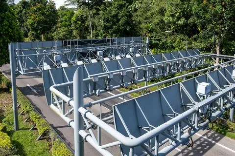 Modern solar panel array in green park setting Fotos de archivo