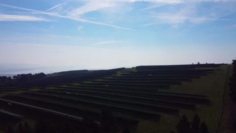 Modern solar panel array on hilltop in UK Stock Footage 332626980