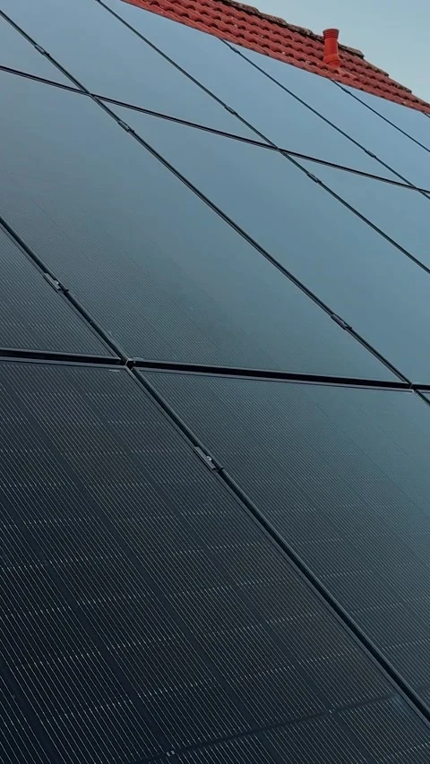 Modern solar panels on rooftop of private house producing energy Video stock 335858930