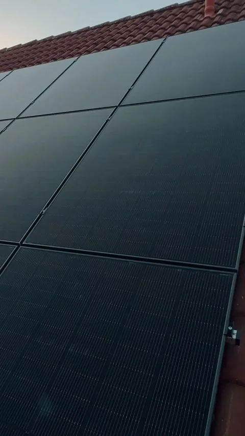 Modern solar panels on rooftop of private house producing energy Stock Footage 335858931