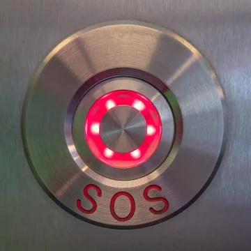 Modern SOS, help button made of stainless steel metal and illuminated glass i Stock Photos