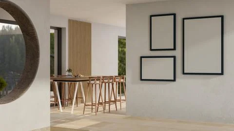 A modern spacious indoor corridor with a table with stools, and frames mock.. 스톡 사진