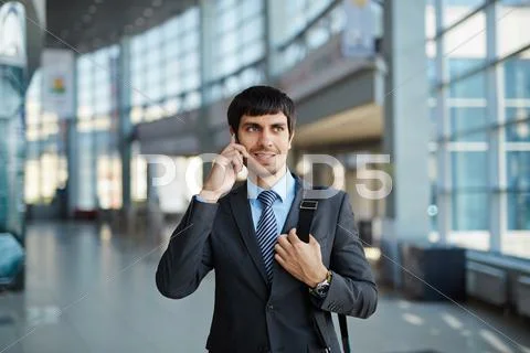 Modern specialist calling after work inside office center Stock Photos