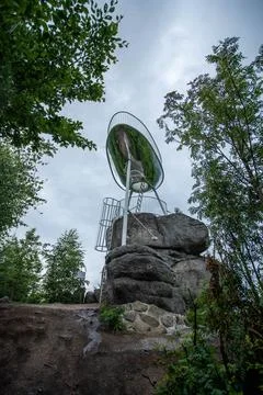 Modern Spicka observation tower with large circular mirror structure standing on Stock Photos