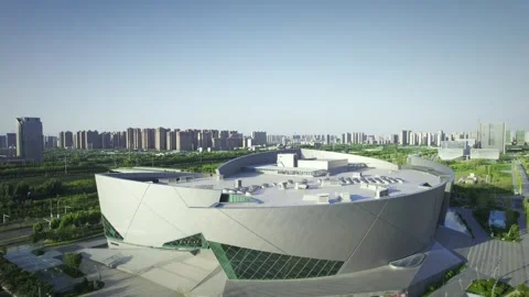 Modern Sports Arena with Angular White Facade and Green Glass Windows 動画素材 337423274