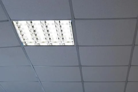 Modern square lamp in the ceiling close up Stock Photos