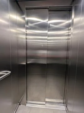 Modern Stainless Steel Elevator Interior, Closed Doors Stock Photos