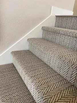 Modern Stairway with Chevron Carpet Pattern Stock Photos