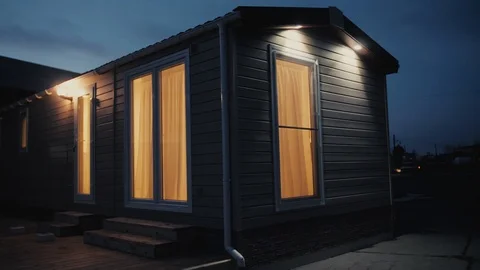 Modern static caravan. mobile House. evening time, in the windows light Stock Footage 87951127