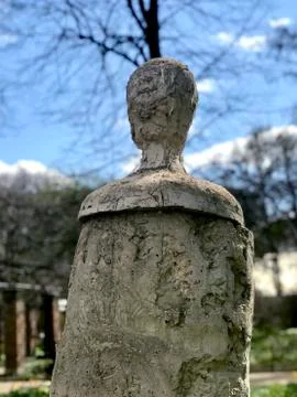 Modern statue against the background of trees and clouds Stock-Fotos