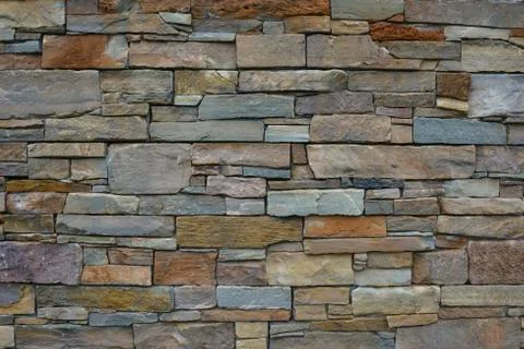 Modern stone brick wall background Fotos Stock