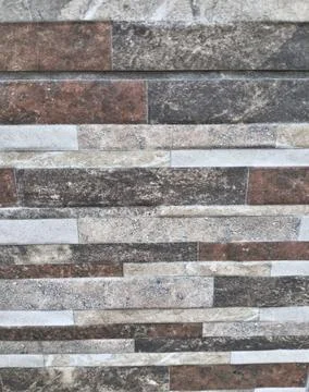Modern stone tile wall texture with brown and gray marble pattern Stockfoto's