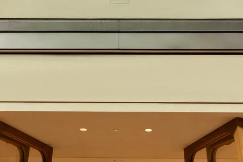A modern storefront presents an empty space where a logo can be placed. The s Stock Photos