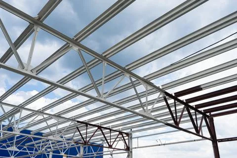 Modern storehouse construction site, structural steel structure of new commer Stock Photos