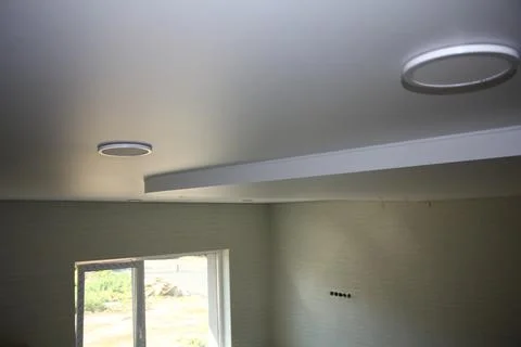 Modern Stretch Ceiling with Round Recessed LED Lights Stock Photos