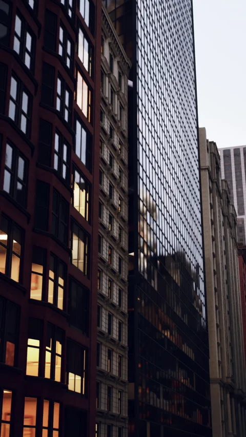 Modern structure blending sleek glass with textured brick for visual contrast Video stock 329682684