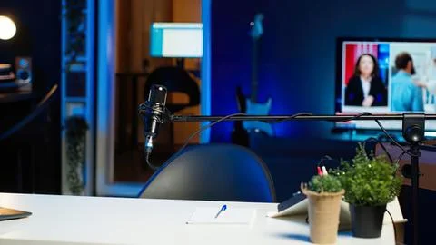 Modern studio podcast recording setup with screen 库存照片