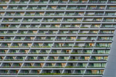 Modern-style building with multiple windows and grassy balconies in Singapore Fotos de archivo