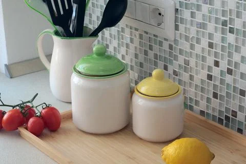 Modern style ceramic containers, jars for food. Food in kitchen. Interior style Stock Photos