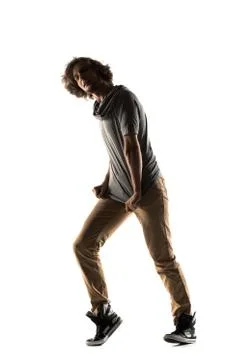 Modern style dancer posing on studio background Stock Photos