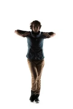 Modern style dancer posing on studio background Stock Photos