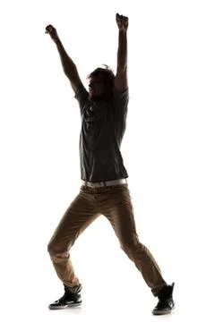 Modern style dancer posing on studio background Stock Photos