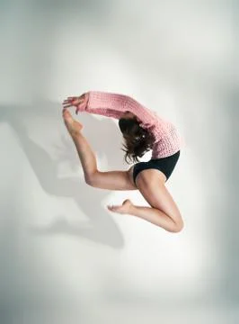 Modern style dancer  posing on white background Stock Photos