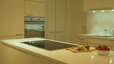 Modern style of kitchen design with white cabinets and quartz kitchen countertop Vídeos de archivo 114317340