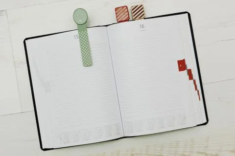 Modern-styled diary with cozy bookmarks Stock Photos