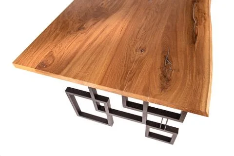 Modern stylish table in Loft style: wooden oak cover and geometric metal base Fotos Stock