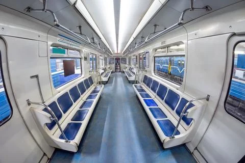 Modern subway metro train inside interior, empty public transport with blue s Stock Photos