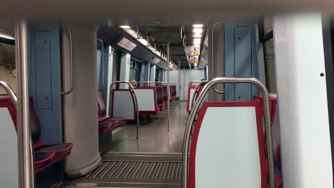 Modern Subway Train Interior With Red Seats and Stainless Steel Poles, Lisbon Stock Footage 339903774