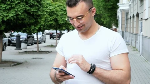 Modern successful man use a mobile phone Stock Footage 113748336